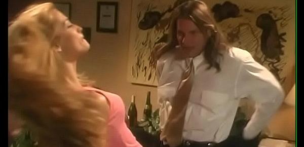  Longhaired man took occasion to poke his administrative assistant Jessica Drake who was  head over heels in love with him on her working table